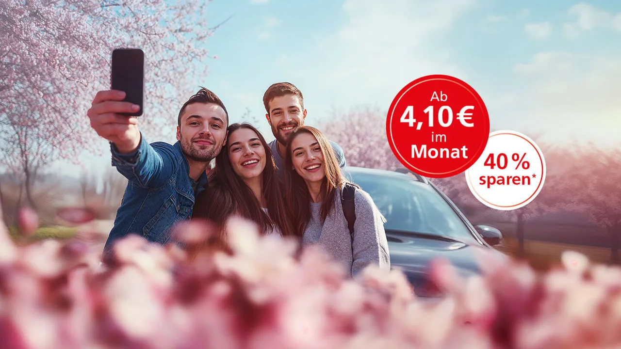 Junge Leute hinter lila Blumen