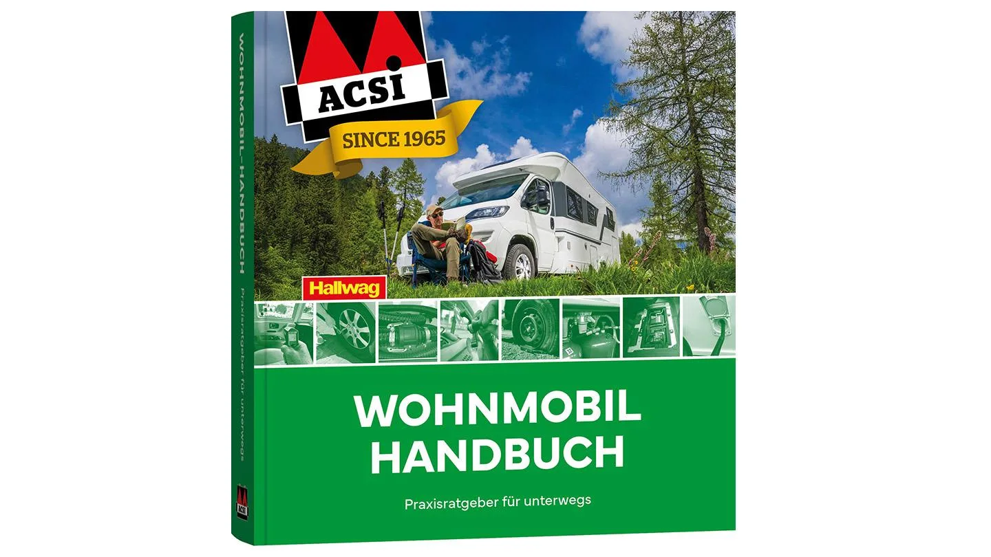 Bild eines Wohnmobilhandbuchs auf dem ein Mann im Campingstuhl vor seinem Wohnmobil sitzt